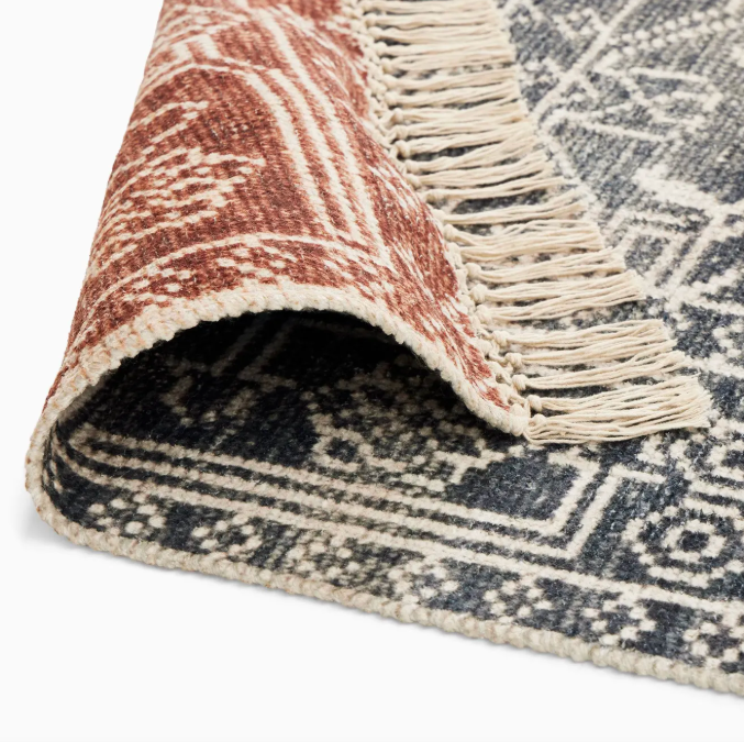 Is a rug pad necessary for a reversible rug?